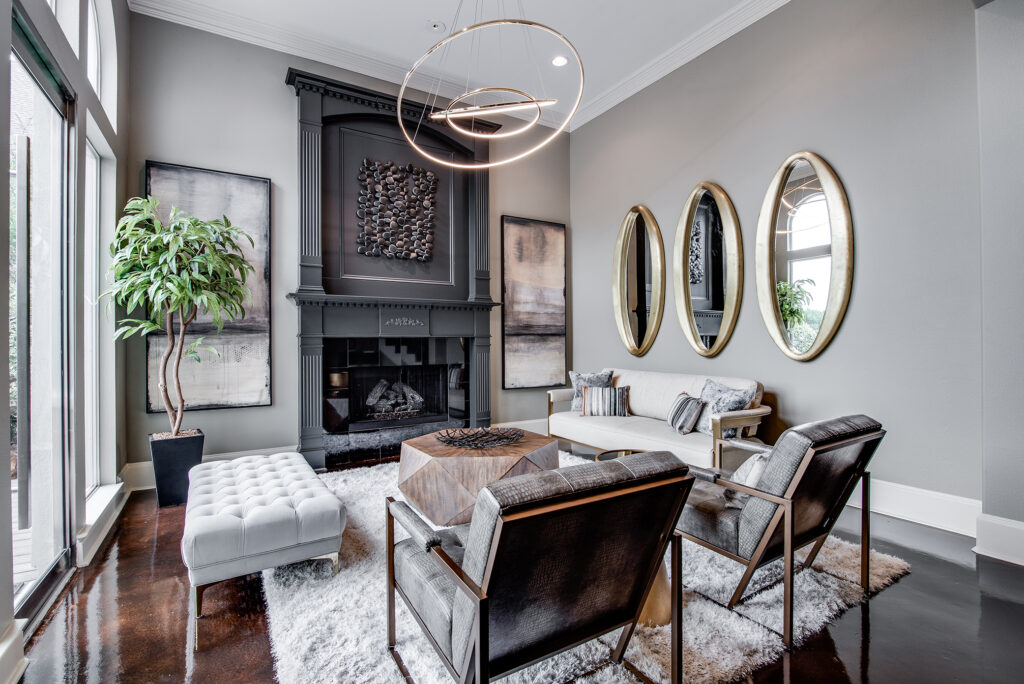 family room with white couch and grey fireplace. Orono, mn interior design