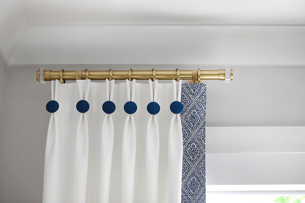 Side panels paired with shades, or fully closing draperies will keep bright sunlight out in your luxury bedroom so that you can sleep when the sun rises too early!
